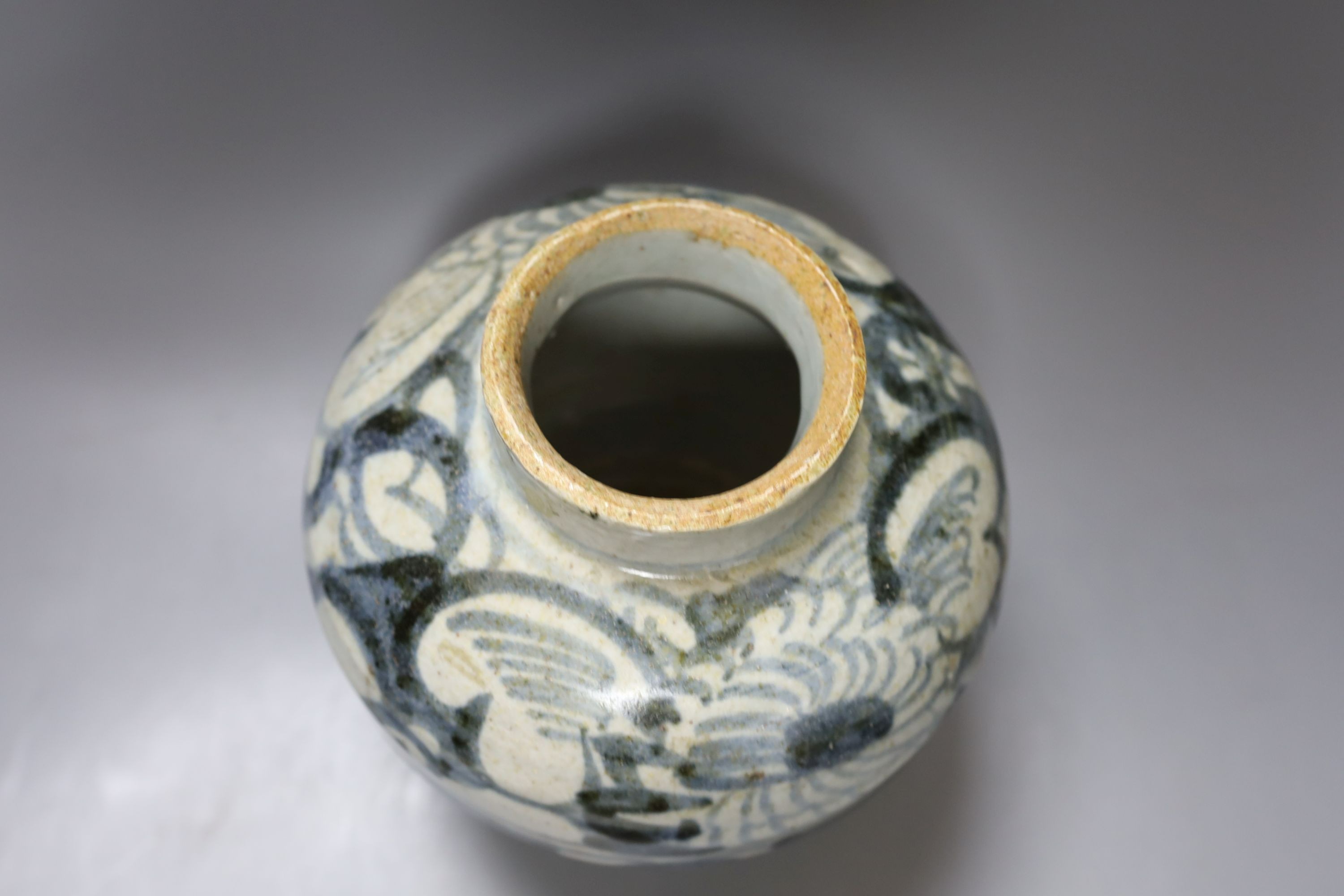 A South East Asian blue and white porcelain jar and cover, possibly Sawankhalok 26cm